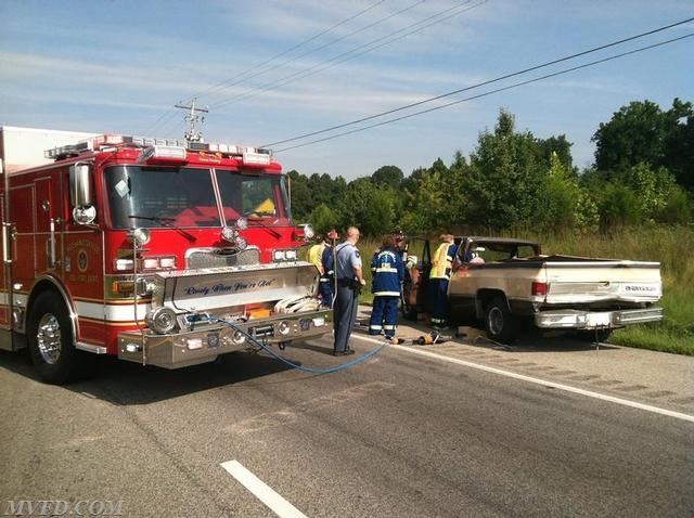 Rescue Squad 2 operating on motor vehicle collision on Three Notch Road at Mechanicsville Road 